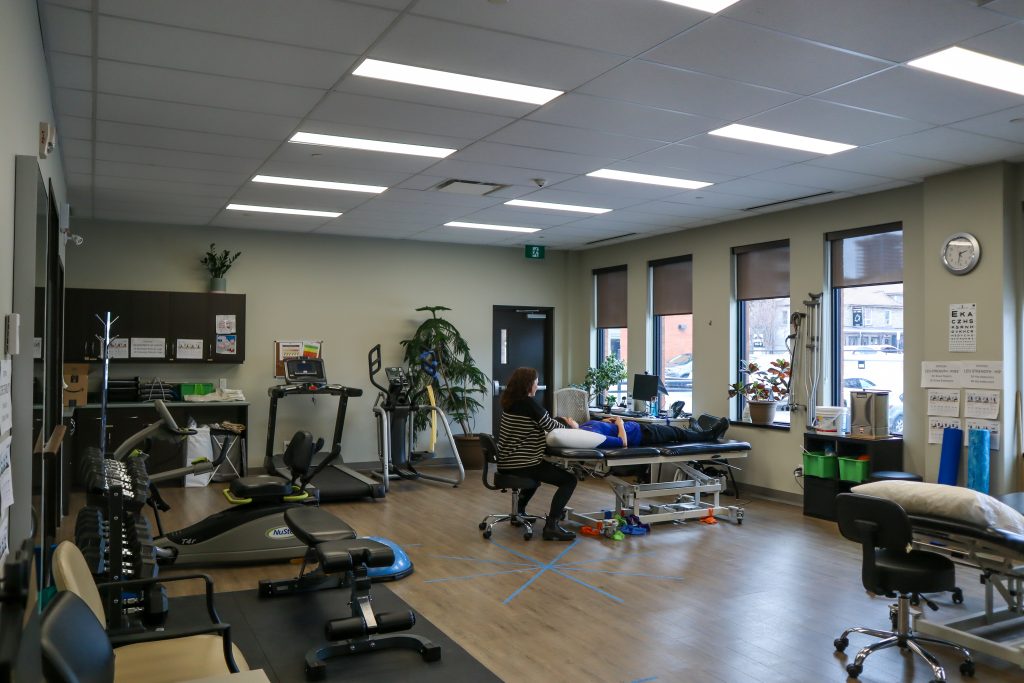 Physiotherapist with a patient at 123 James.
