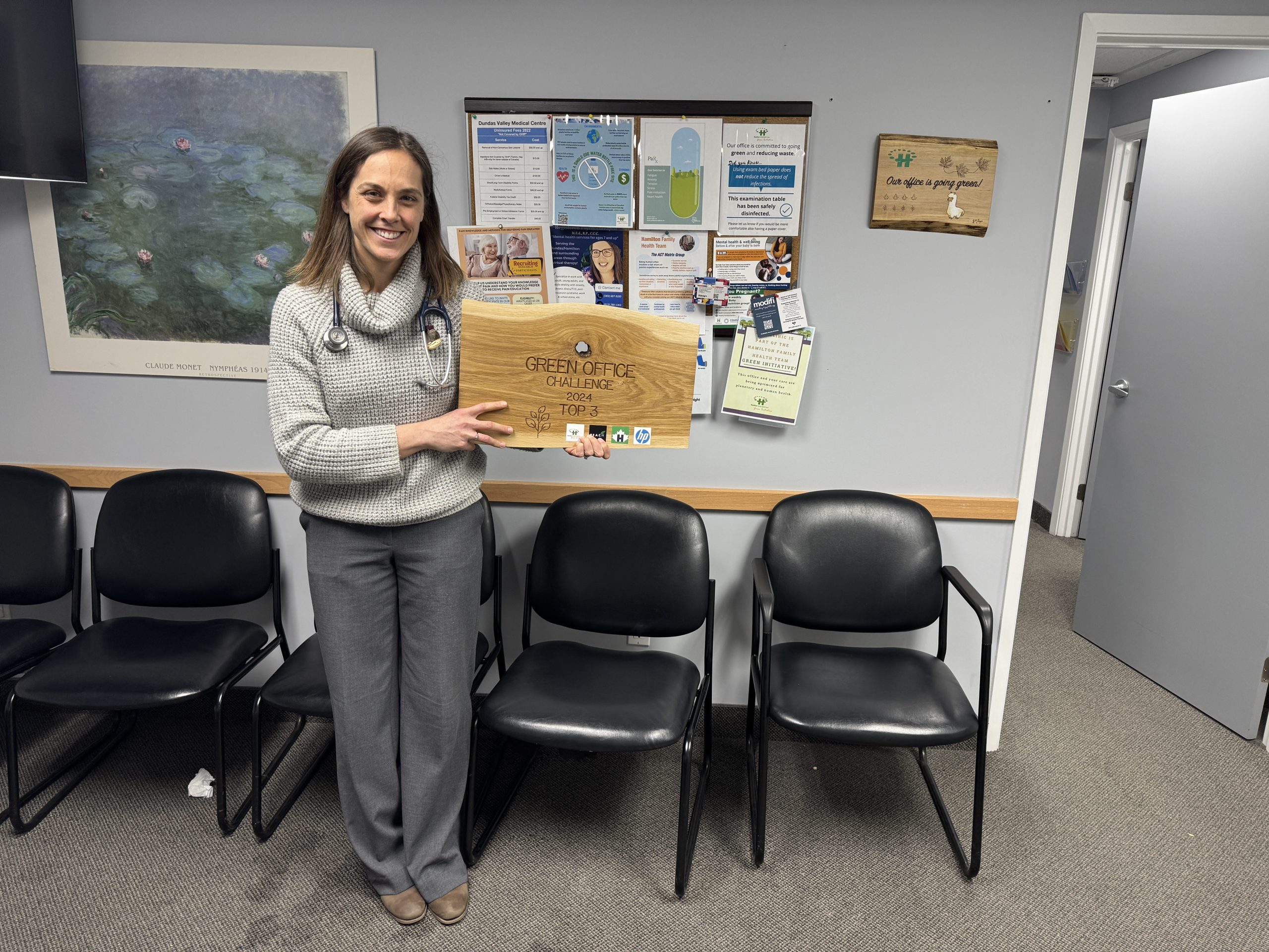 Dr. Zoe Del Bel Belluz holding her prize