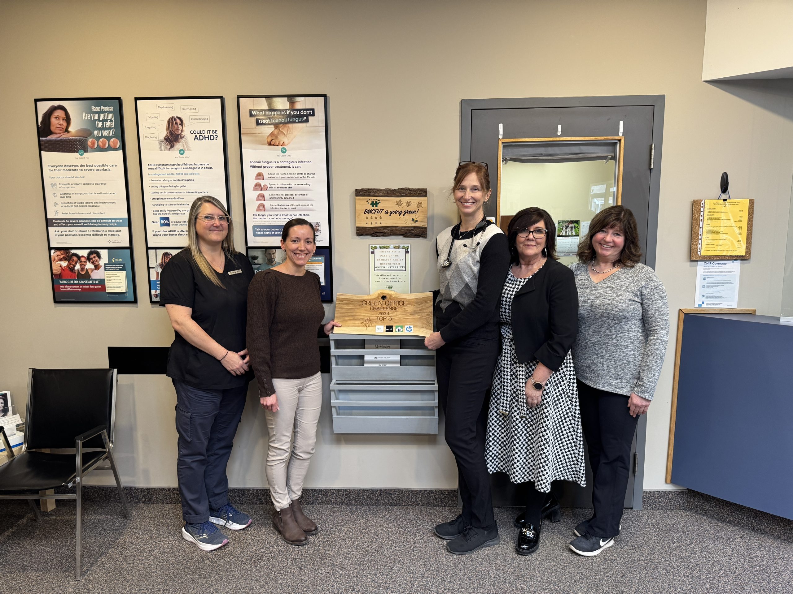 Dr. Cari Reed and her team (Dr. Reed is shown in the middle holding her prize)